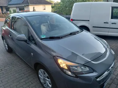Gebraucht Opel Corsa drive 101 PS (74 kW) 2016 Silber Kleinwagen