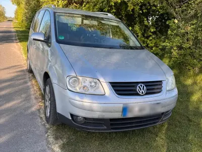 Second-hand VW Touran 150 CP (110 kW) 2004 Argintiu Monovolum
