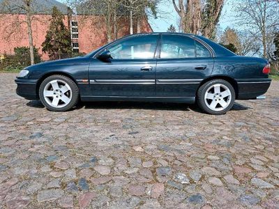 Second-hand Opel Omega 170 CP (125 kW) 1999 Negru Berlinǎ