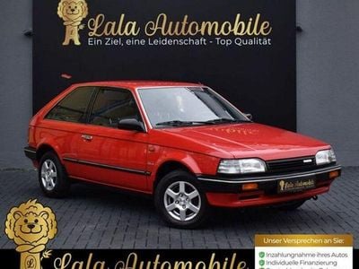 Gebraucht Mazda 323 73 PS (53 kW) 1988 Rot Kleinwagen