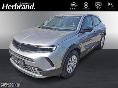 Gebraucht Opel Mokka-e Edition 100 kW (136 PS) 2022 Kontrast grau/quarz silber SUV