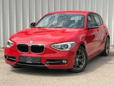 Gebraucht BMW 118 Sport Line 170 PS (125 kW) 2011 Rot Kleinwagen