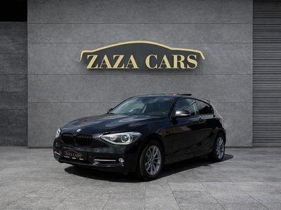Second-hand BMW 118 Comfort Edition 143 CP (105 kW) 2014 Negru Hatchback