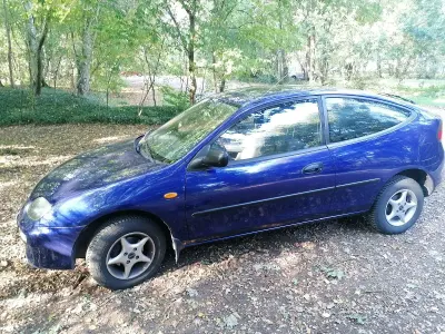 Używany Mazda 323C 88 KM (64 kW) 1994 Niebieski Hatchback