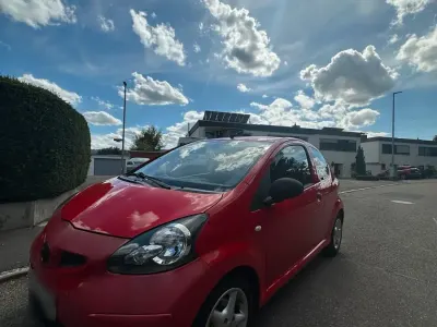 Gebraucht Toyota Aygo 68 PS (50 kW) 2006 Rot Kleinwagen