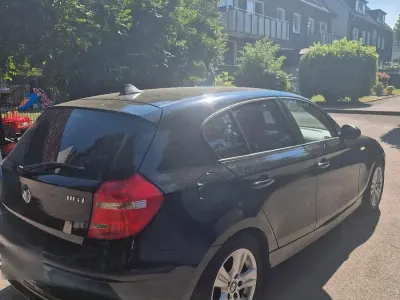 Gebraucht BMW 116 120 PS (88 kW) 2009 Schwarz Kleinwagen