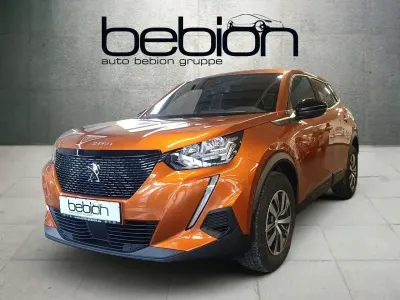 Gebraucht Peugeot 2008 Active 101 PS (74 kW) 2023 Metfa orange fusion SUV