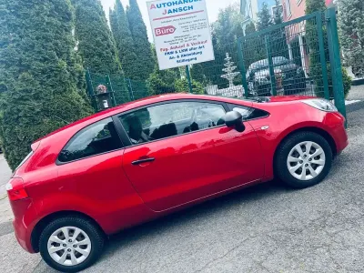 Używany Kia Rio 86 KM (63 kW) 2014 Czerwony