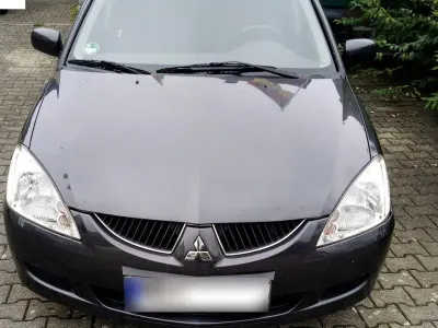 Gebraucht Mitsubishi Lancer Invite 98 PS (72 kW) 2005 Schwarz Kombi