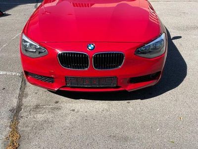 Second-hand BMW 118 143 CP (105 kW) 2012 Roșu Hatchback