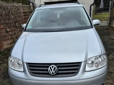Używany VW Touran 115 KM (84 kW) 2003 Srebrny Minivan