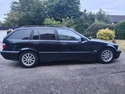 Gebraucht BMW 316 102 PS (75 kW) 1999 Schwarz Kombi