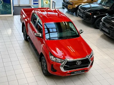 Neu Toyota HiLux Comfort 150 PS (110 kW) 2026 Orange Pickup
