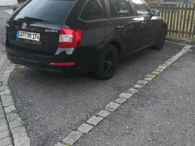 Używany Skoda Octavia 105 KM (77 kW) 2013 Czarny Kombi
