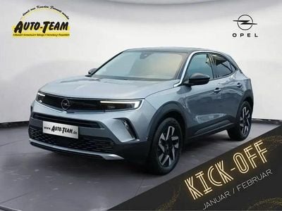 Gebraucht Opel Mokka-e Elegance 100 kW (136 PS) 2023 Kontrast grau metallic SUV