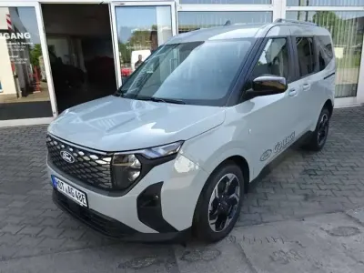 Gebraucht Ford Tourneo Courier Titanium 100 kW (136 PS) 2025 Cactus gray Van / Kleinbus