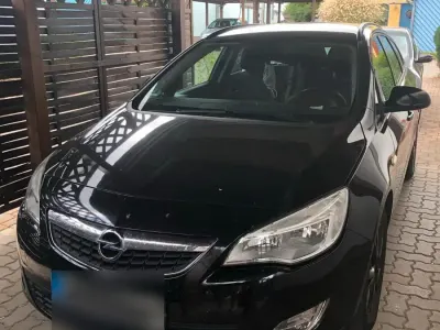 Gebraucht Opel Astra 125 PS (91 kW) 2010 Schwarz Kombi