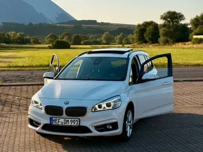 Gebraucht BMW 218 Gran Tourer Luxury Line 150 PS (110 kW) 2015 Weiß Van / Kleinbus