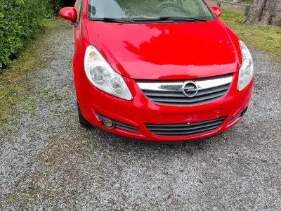 Używany Opel Corsa 65 KM (47 kW) 2007 Czerwony Hatchback