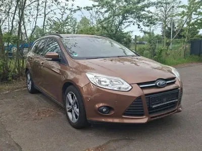 Occasion Ford Focus Trend 125 ch (91 kW) 2014 Marron Berline