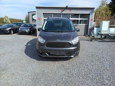 Używany Ford Tourneo Courier 101 KM (74 kW) 2017 Szary Minivan