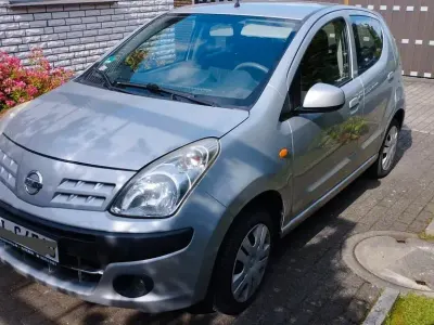 Gebraucht Nissan Pixo Acenta 68 PS (50 kW) 2011 Silber Kleinwagen