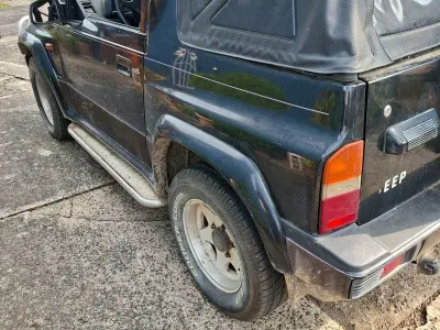 Gebraucht Suzuki Vitara 82 PS (60 kW) 1991 Schwarz Cabrio