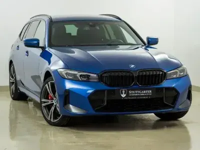 Gebraucht BMW 330e M Sport 292 PS (214 kW) 2022 Portimao blau m Kombi