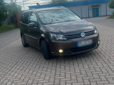 Gebraucht VW Touran 105 PS (77 kW) 2012 Braun Van / Kleinbus