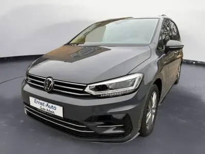 Neu VW Touran Comfortline 150 PS (110 kW) 2025 Grau Van / Kleinbus