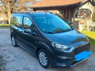 Gebraucht Ford Tourneo Courier Ambiente 101 PS (74 kW) 2019 Grau Van / Kleinbus