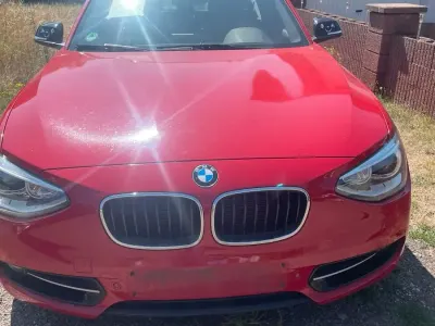 Gebraucht BMW 116 Sport Line 136 PS (100 kW) 2014 Rot Kleinwagen