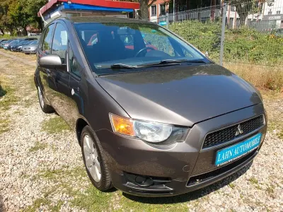 Gebraucht Mitsubishi Colt 95 PS (69 kW) 2011 Braun Kleinwagen