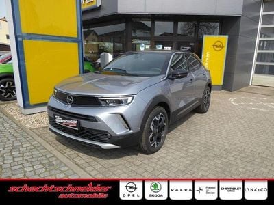 Gebraucht Opel Mokka-e Ultimate 100 kW (136 PS) 2023 Kontrast grau metallic SUV