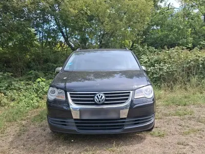 Gebraucht VW Touran 105 PS (77 kW) 2009 Schwarz Van / Kleinbus