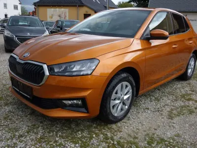 Gebraucht Skoda Fabia Selection 116 PS (85 kW) 2024 Phoenixorange metallic Kleinwagen