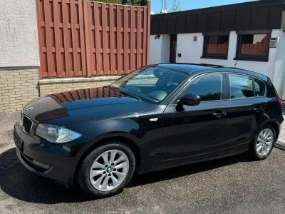 Gebraucht BMW 116 116 PS (85 kW) 2010 Schwarz Kleinwagen