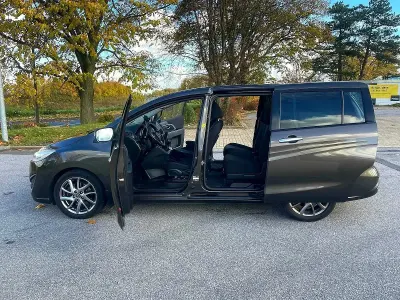 Gebraucht Mazda 5 Sports-Line 116 PS (85 kW) 2014 Braun Van / Kleinbus