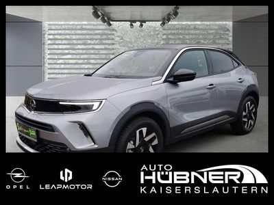 Gebraucht Opel Mokka-e Elegance 100 kW (136 PS) 2022 Kontrast grau/quarz silber SUV