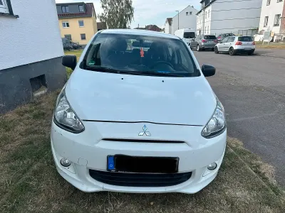 Gebraucht Mitsubishi Space Star 71 PS (52 kW) 2015 Weiß Kleinwagen