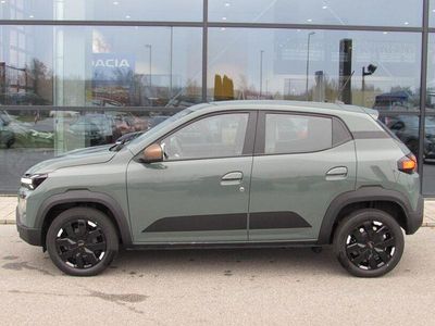 Gebraucht Dacia Spring Extreme 47 kW (65 PS) 2024 Olivgrün Kleinwagen