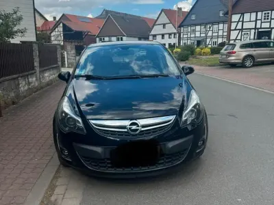 Gebraucht Opel Corsa 89 PS (65 kW) 2011 Schwarz Kleinwagen