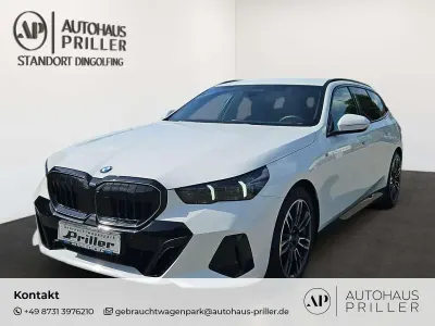 Gebraucht BMW 520 M Sport 197 PS (144 kW) 2024 Alpinweiss iii Kombi