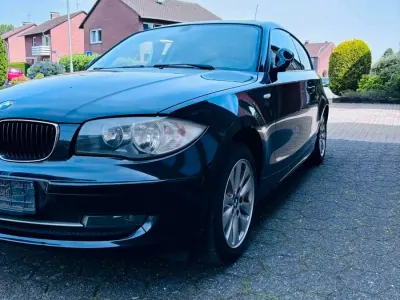 Gebraucht BMW 116 122 PS (89 kW) 2008 Schwarz Kleinwagen