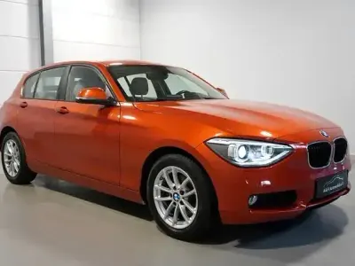 Begagnad BMW 120 Advantage 184 HK (135 kW) 2015 Orange Halvkombi