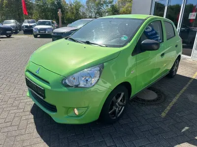 Gebraucht Mitsubishi Space Star Basis 71 PS (52 kW) 2014 Grün Van / Kleinbus