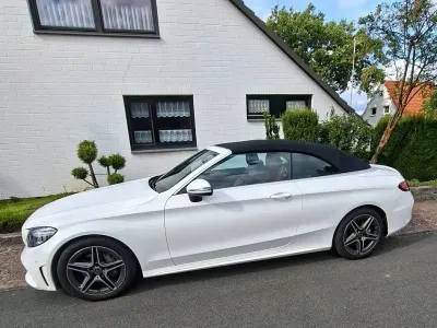 Gebraucht Mercedes C180 AMG 156 PS (114 kW) 2023 Weiß Cabrio