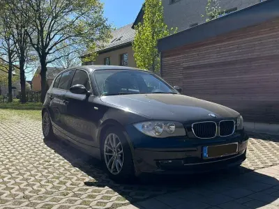 Gebraucht BMW 116 122 PS (89 kW) 2008 Schwarz Kleinwagen