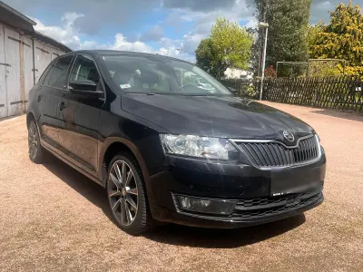 Używany Skoda Rapid 125 KM (91 kW) 2015 Czarny Hatchback