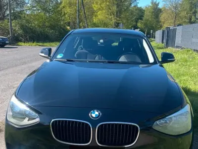Begagnad BMW 114 95 HK (69 kW) 2013 Svart Halvkombi